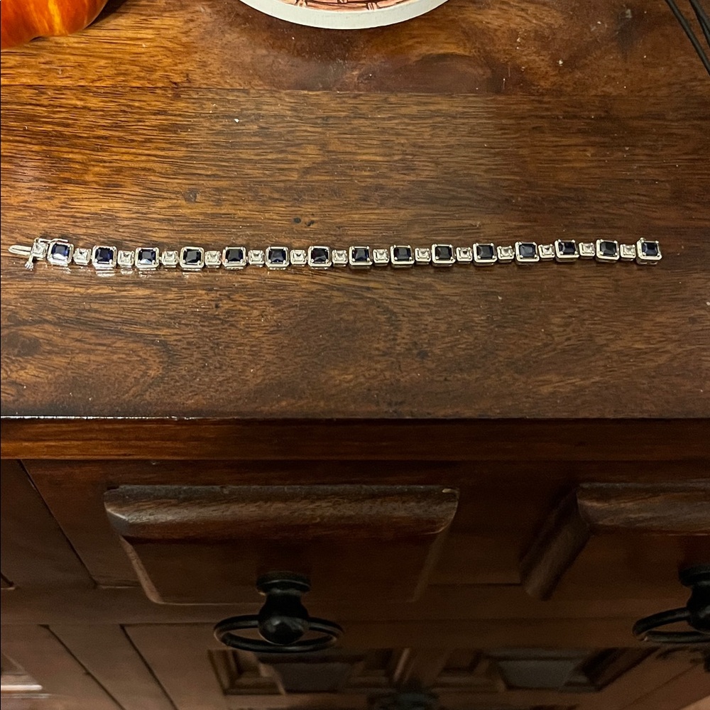 Sterling Silver (stamped) with blue & simulated diamond stones.